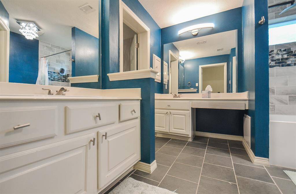 Secondary bathroom. New tile, bath and comode.