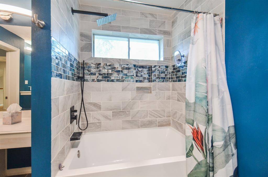 Secondary bathroom. New tile, bath and comode.