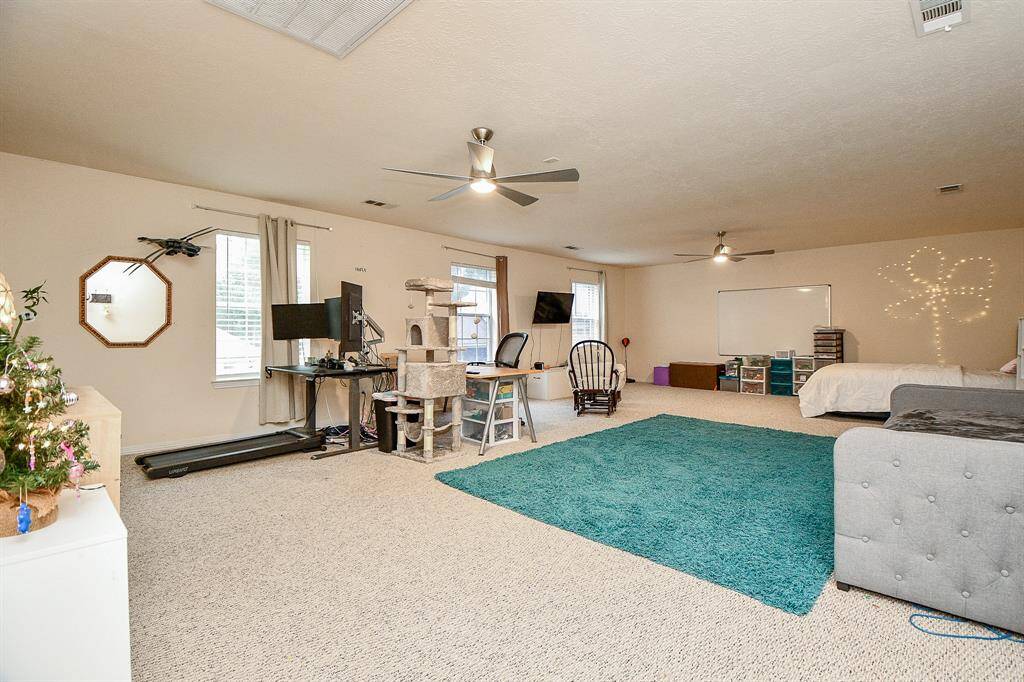 600 Square feet of additional space! this large room above the garage is not part of the home square footage and is perfect for a in law apartment, workspace, or at home office.