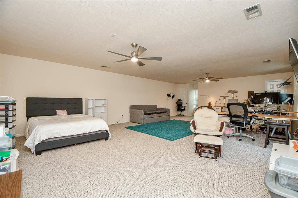 600 Square feet of additional space! this large room above the garage is not part of the home square footage and is perfect for a in law apartment, workspace, or at home office.