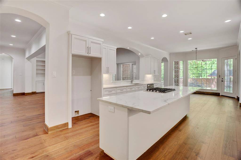 Island kitchen with eat-up seating.