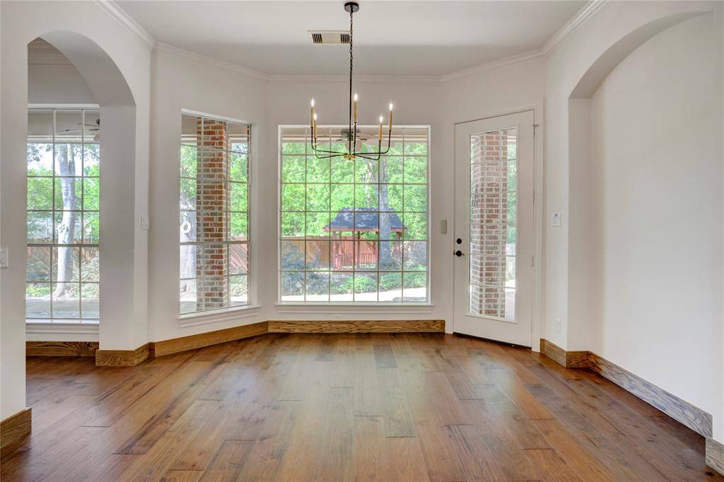 Breakfast room has views of back yard.