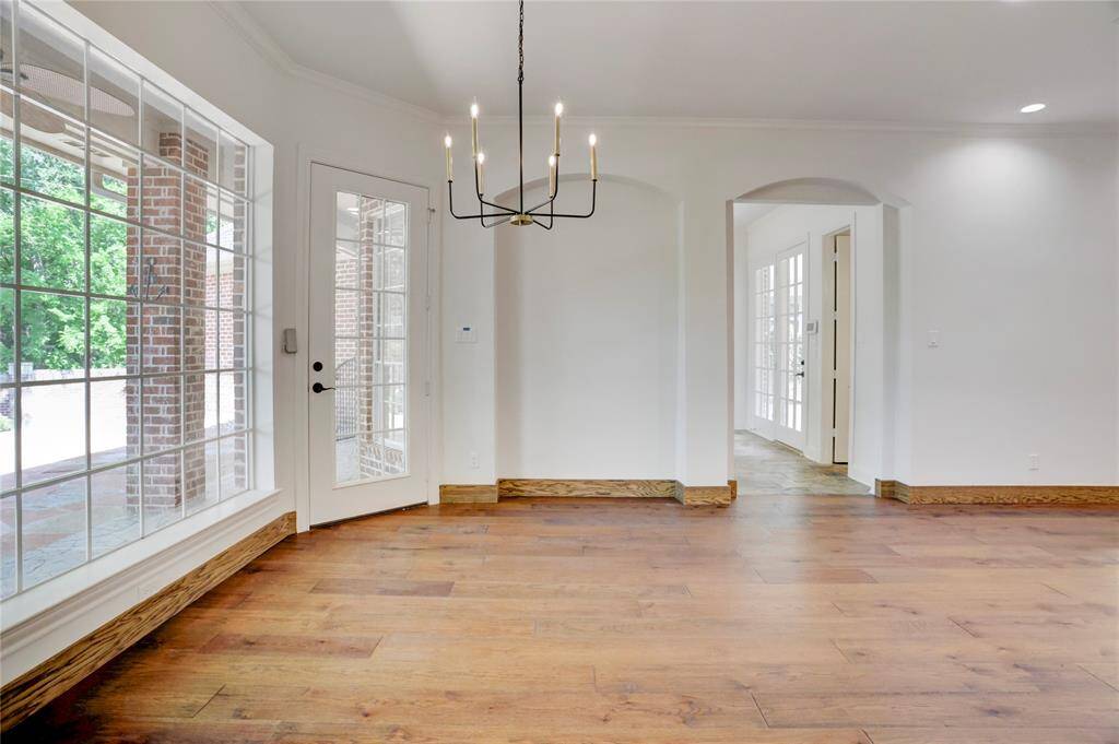 Huge master bedroom with new carpet and ceiling fans with lights.