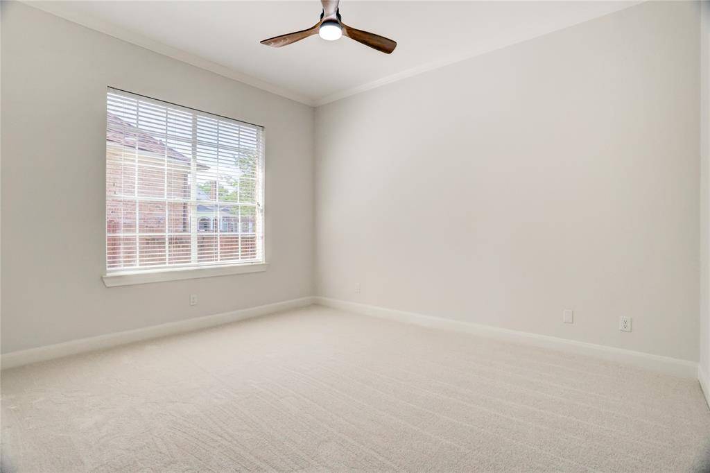 Laundry room off master bedroom.