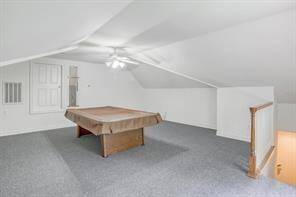 Bonus room above garage. Pool table not included.