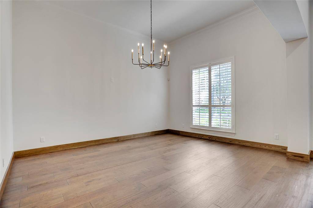 Formal dining room with new light fixture.