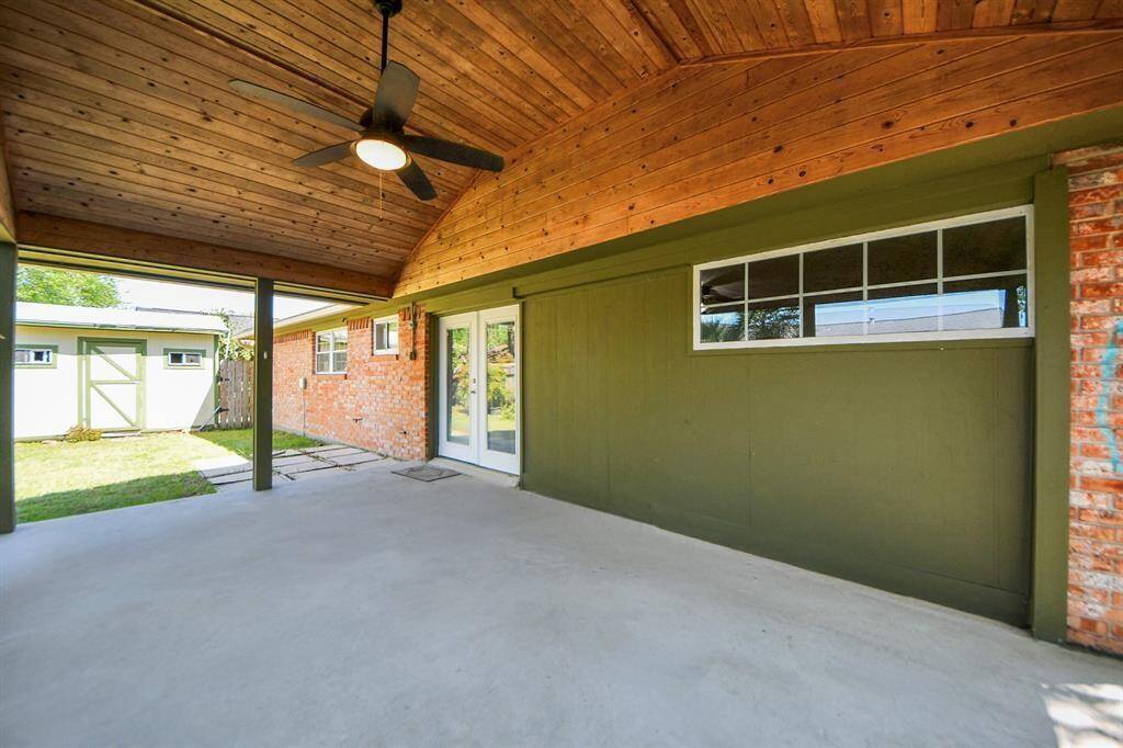 Starting strong with this stunning large covered patio, added in 2010, features gorgeous wood decking, a ceiling fan for added comfort, and freshly applied paint! Just what you need this summer!