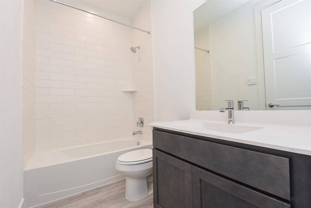 Full Bathroom 3 With Tile Surround To The Ceiling