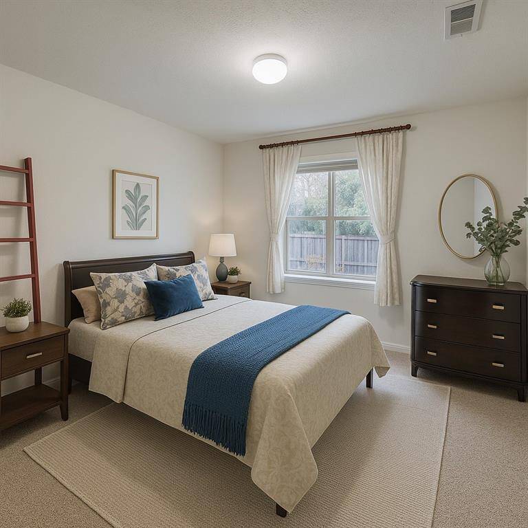 Spacious secondary bedroom #3 with a beautiful view of the sideyard