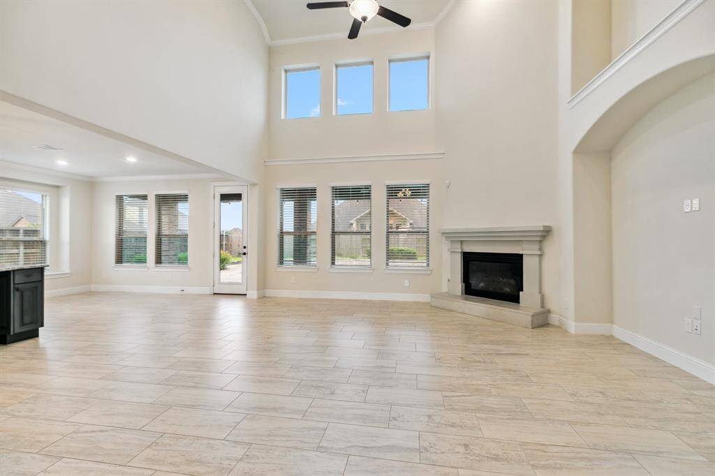 Upper windows provide plenty of light and lower windows offer a great view of the pool and backyard.