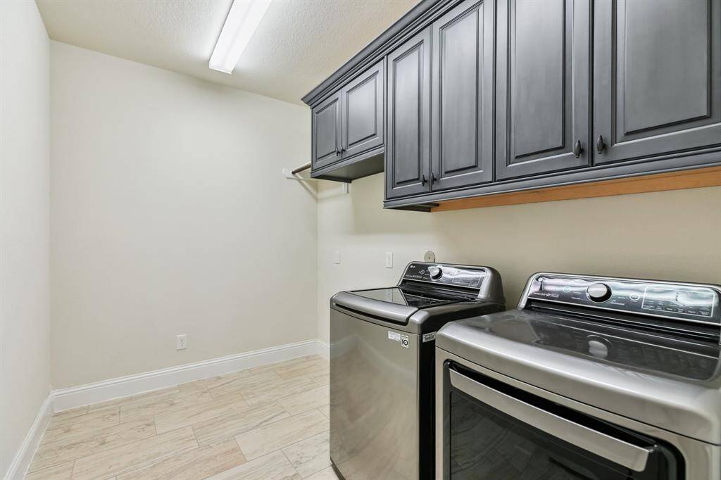 Utility room has refrigerator/freezer nook, and optional LG washer and gas