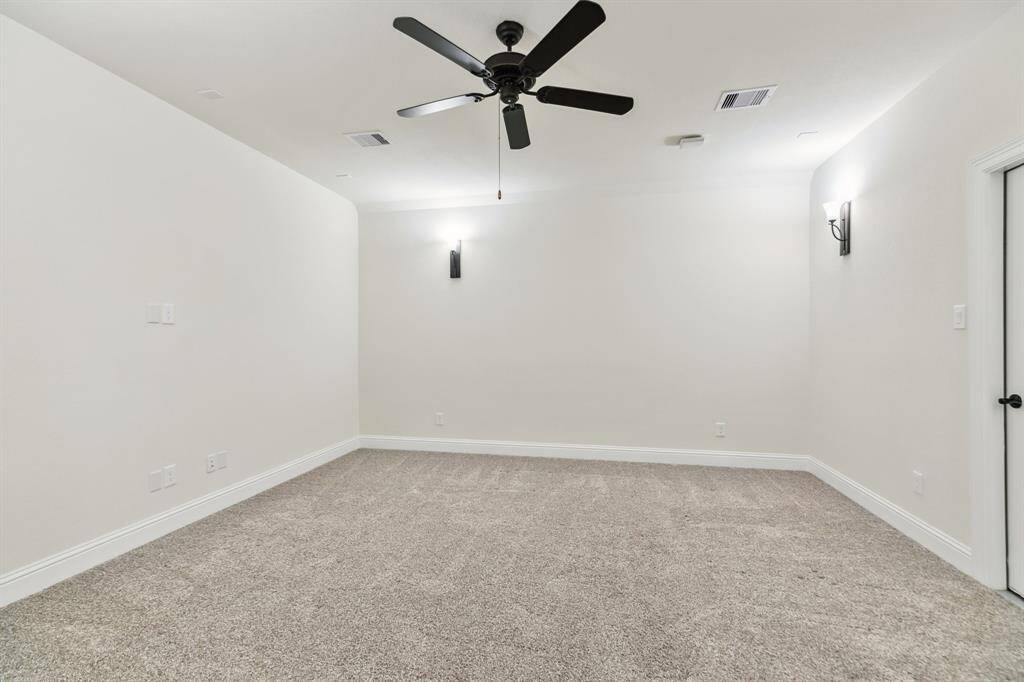 Upstairs media room can accommodate theatre seating.