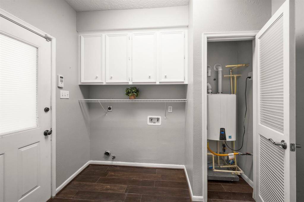 Note the tankless water heater and gas or electric hookups for your W/D.