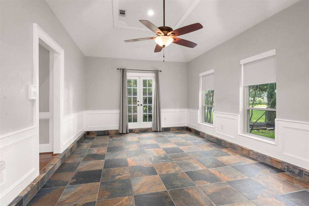 Game room keeps entertaining and kids’ playtime conveniently within earshot, offering a spacious yet connected area that supports both fun and supervision.