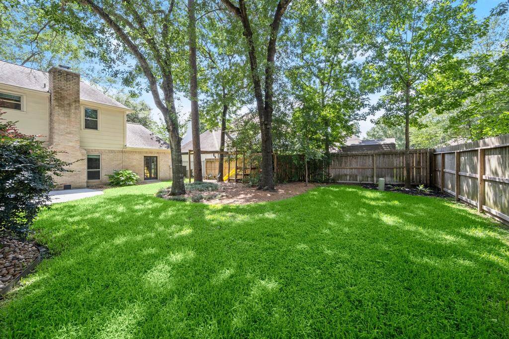Backyard offers the perfect size for play and is beautifully shaded, creating a comfortable space for all-day activities and relaxation.
