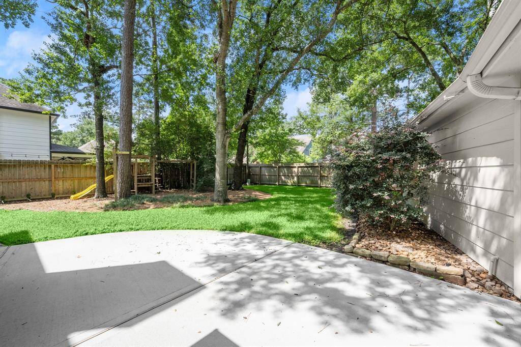 A large patio provides the ideal spot for BBQs and outdoor furniture, perfect for gatherings and enjoying the view.