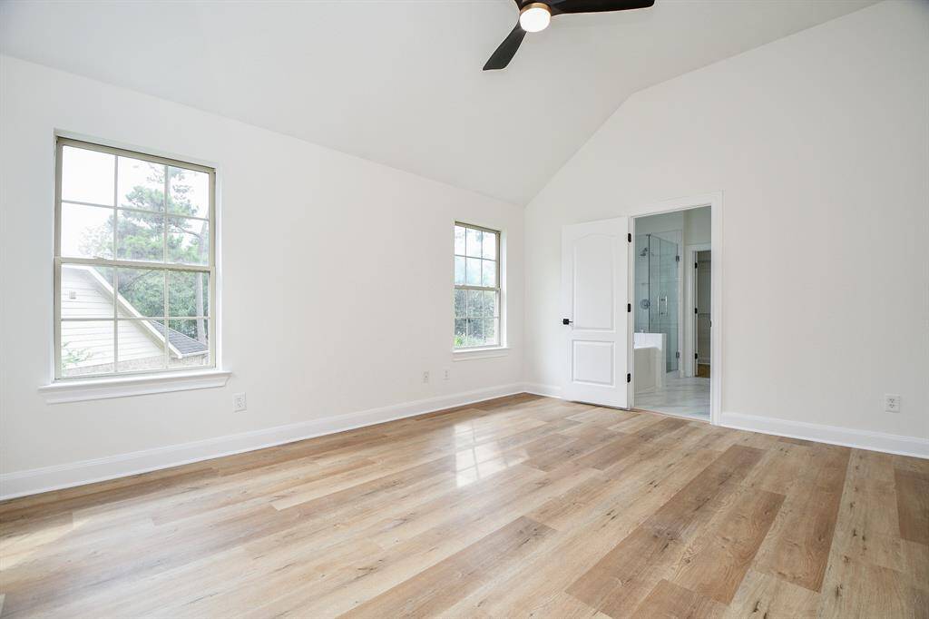 Another view of the primary bedroom located upstairs