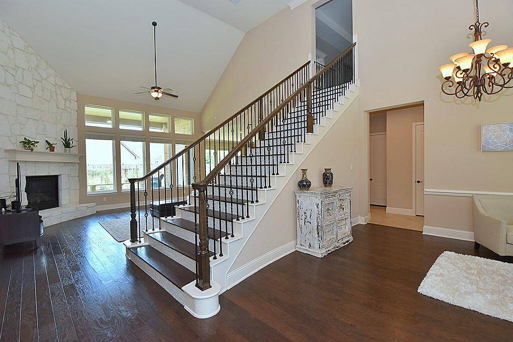 Wrough Iron Stair case with wood floors!
