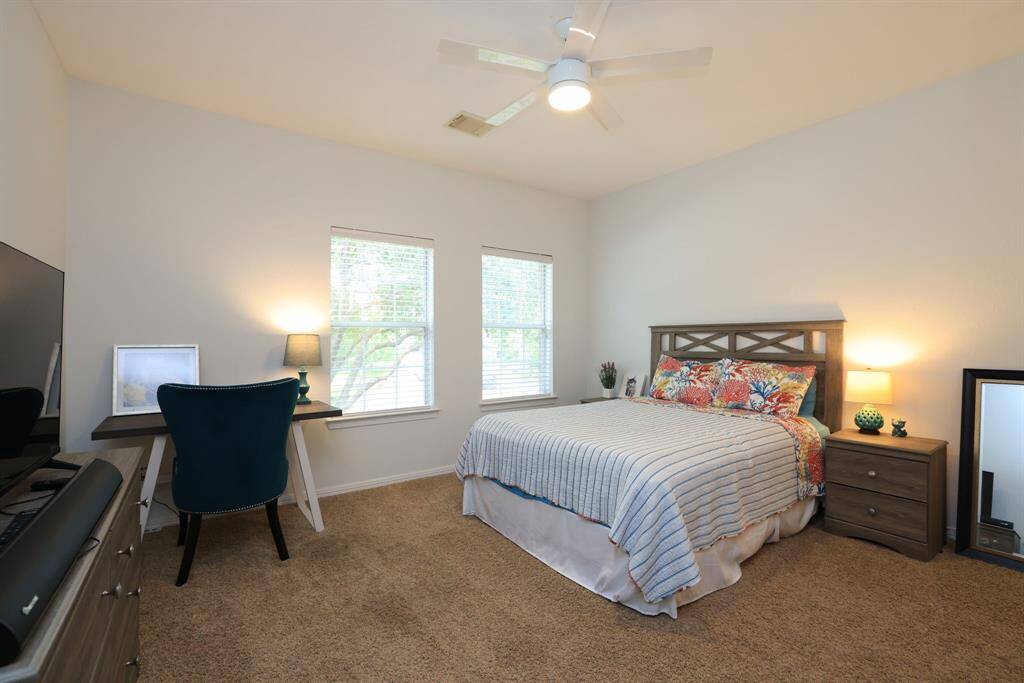 Bedroom 5 faces front of home and adjoins a Hollywood bath. Walk in closet