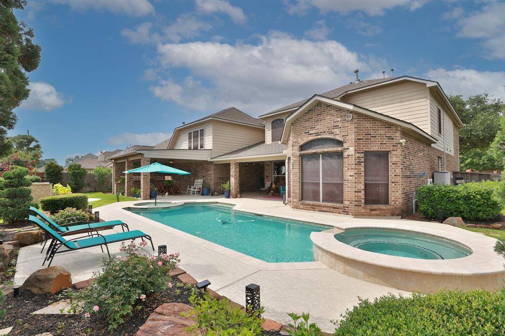 Extensive decking surrounds the pool