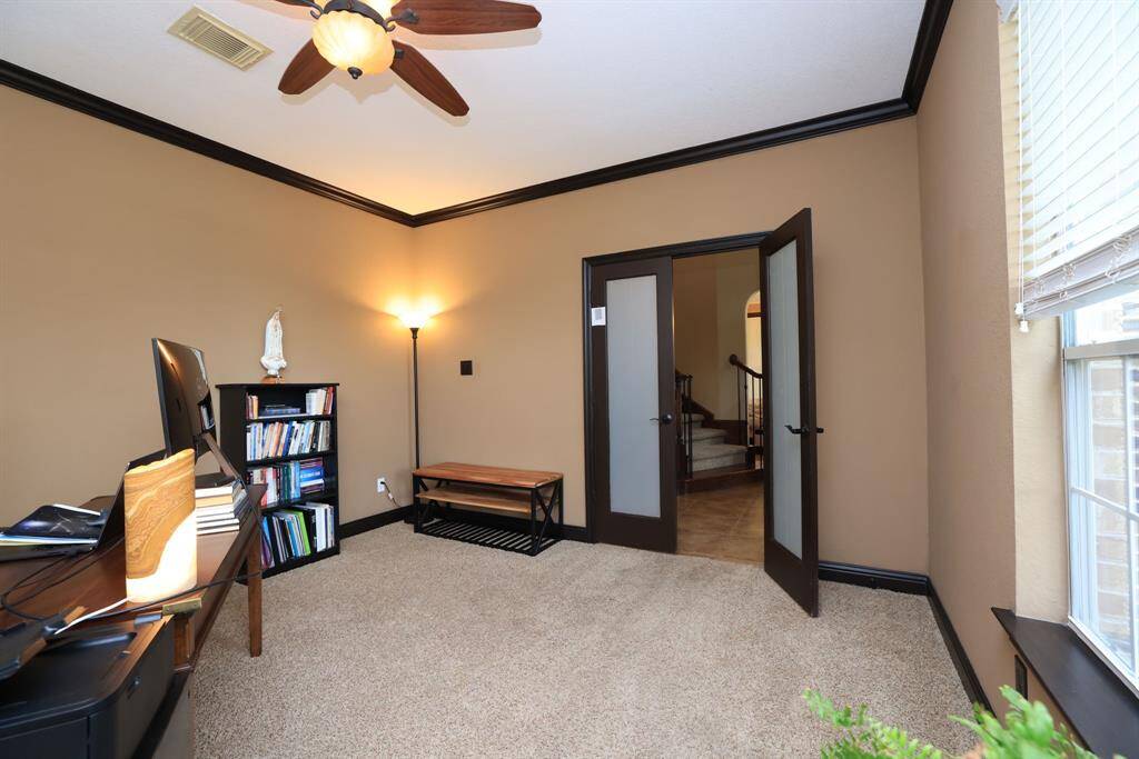 French doors are frosted for privacy.