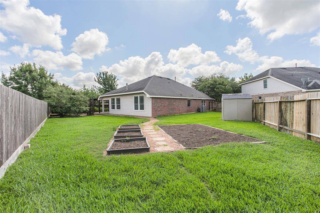 Vegetable garden and storage shed.
