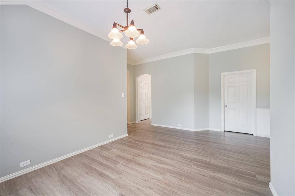 Elegant formal dining room perfect for hosting memorable gatherings.