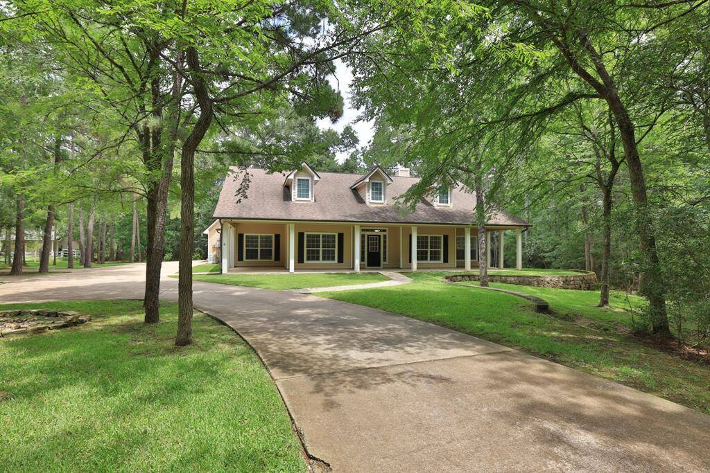 Welcome home to 20618 Timber Ridge Drive, Magnolia, Texas 77355. Nestled on 2.88 peaceful acres in the sought-after Indigo Lake Estates, this beautifully maintained 1.5-story home offers open-concept living and a flexible floor plan designed for comfort and functionality. Enjoy spacious indoor and outdoor areas perfect for everyday living or entertaining. With a quick closing available, this move-in ready property invites you to start your next chapter surrounded by nature.