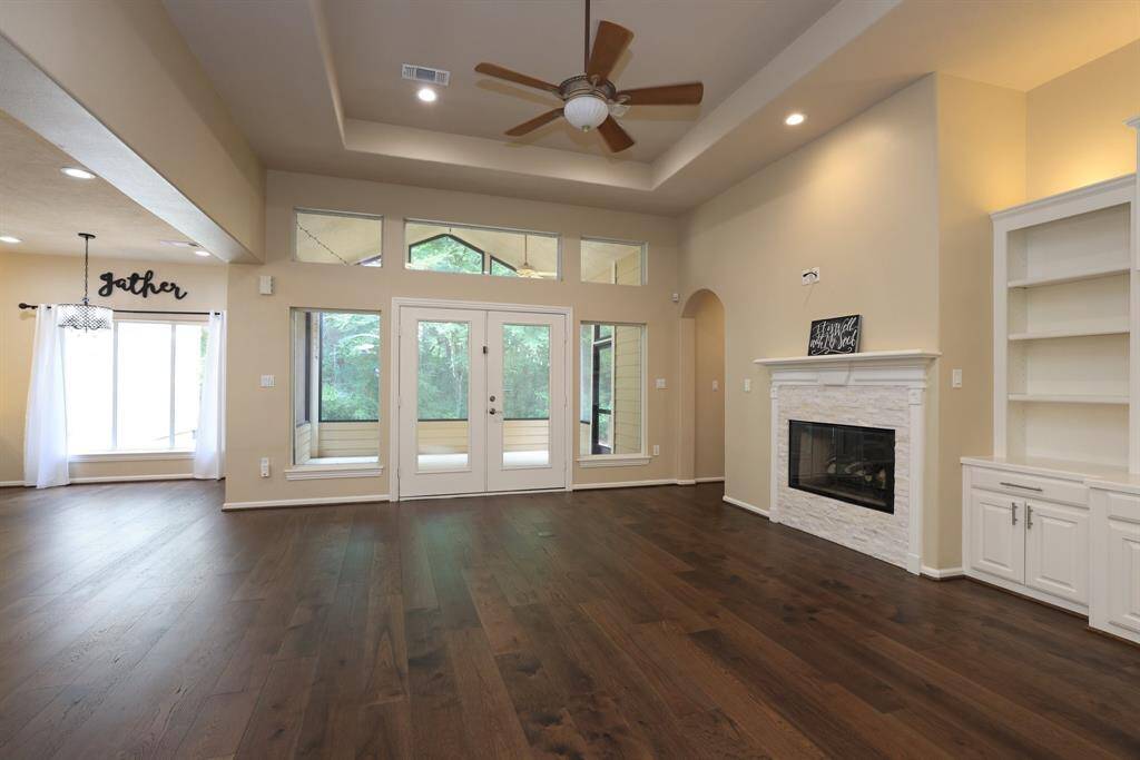 This home offers great natural light throughout and a split-bedroom layout for added privacy. The primary suite is tucked away behind the fireplace, creating a peaceful retreat with direct access to your backyard and outdoor living area perfect for enjoying morning coffee or unwinding at the end of the day.