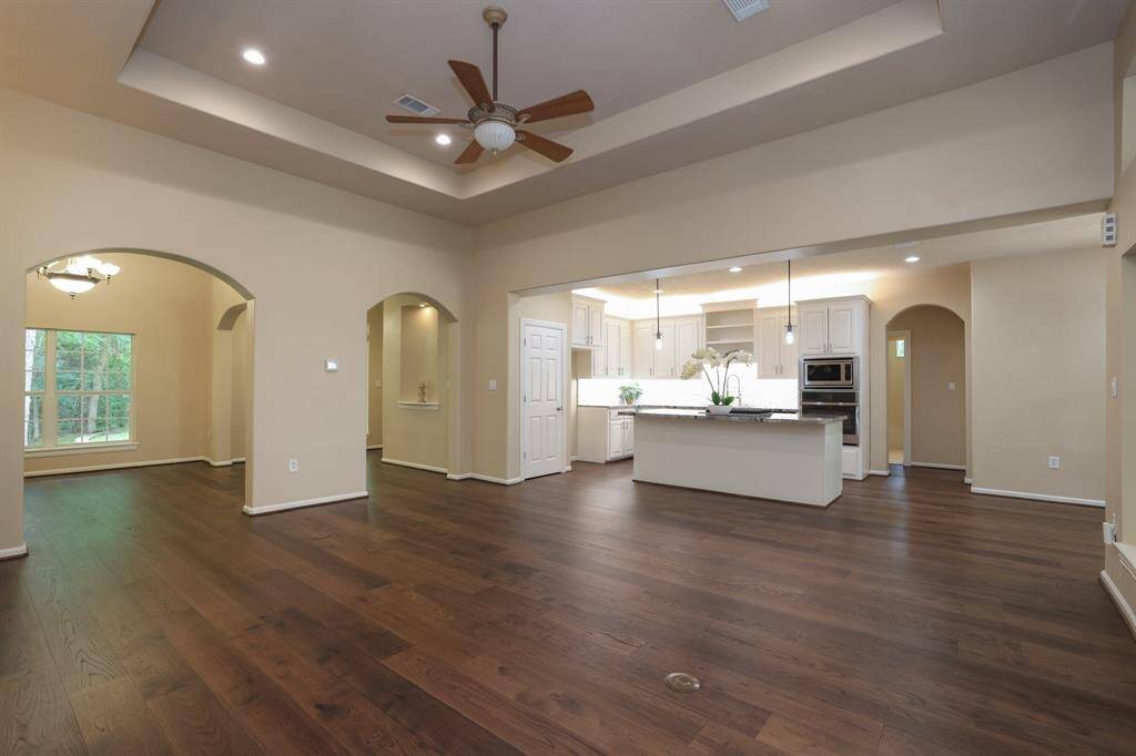 Notice the elegant ceiling design and updated recessed lighting that enhance the home's modern appeal and warm ambiance. This beautifully maintained property is move-in ready and available for a quick closing, a perfect opportunity to settle in and enjoy summer in your new home!