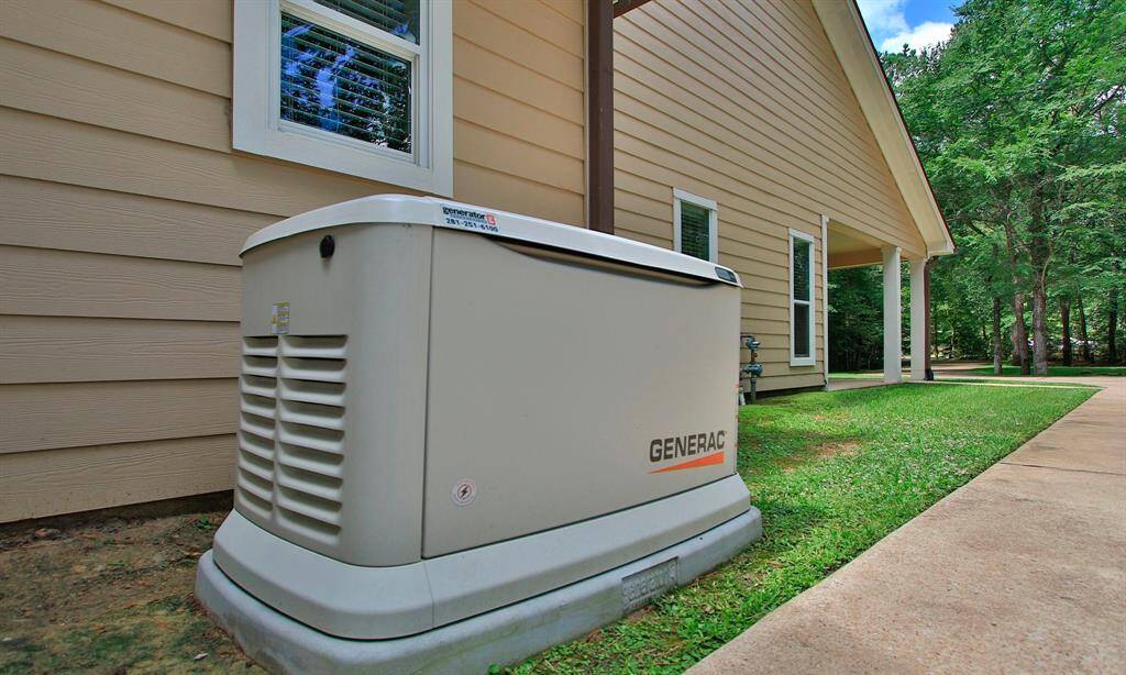 2023 convection oven and a durable cast iron sink with updated faucet (2020). Three bathroom sinks and faucets were replaced in 2020, adding fresh function and style. The utility room cabinets were painted in 2019, giving the space a clean, refreshed look. A powerful 26 kW Generac whole house generator was added in 2024, offering peace of mind and reliable backup power