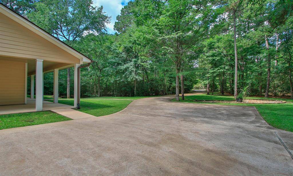 Beautifully updated home with 2019 backyard fire pit and seating area, 2024 front yard recessed wall, Rain Bird 12-zone sprinkler system, 2023 wood and tile flooring, stacked stone fireplace, painted cabinets (2022), granite counters in kitchen and baths, 2023 kitchen backsplash, and recessed lighting in six rooms.