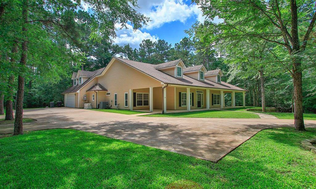 Notice the extensive concrete flatwork and additional parking slips, perfect for guests or extra vehicles. A charming wrap-around front porch welcomes you home, while the enclosed back covered porch offers a peaceful space to entertain or simply relax and take in the surrounding wildlife and natural beauty this property provides. A true blend of comfort and countryside living.