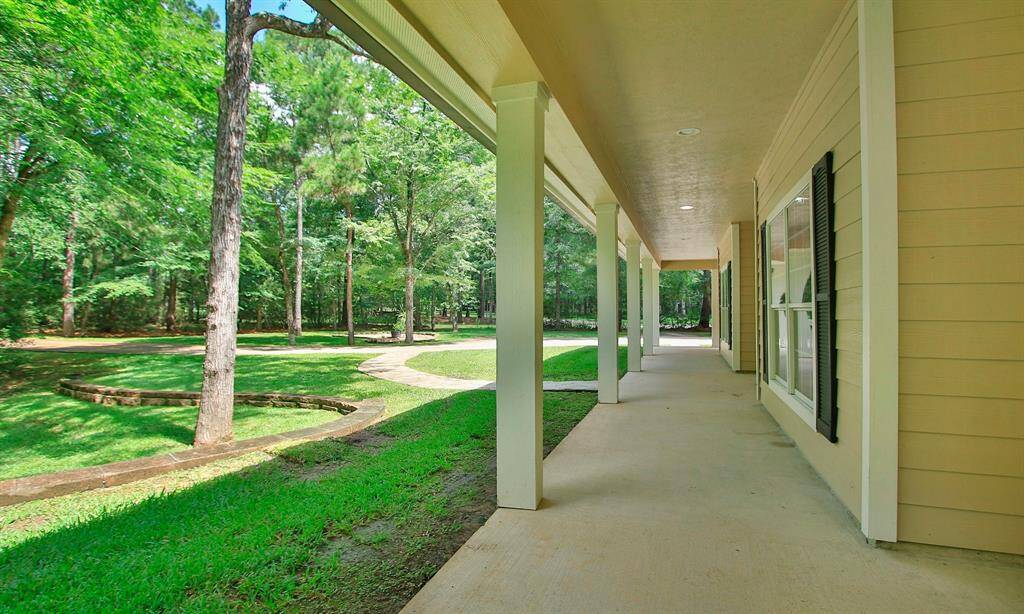 So many outdoor living spaces to enjoy, whether you're curled up with a good book, sipping your favorite beverage, or simply taking in the peaceful surroundings. This property invites you to slow down and savor the beauty of nature from every angle.