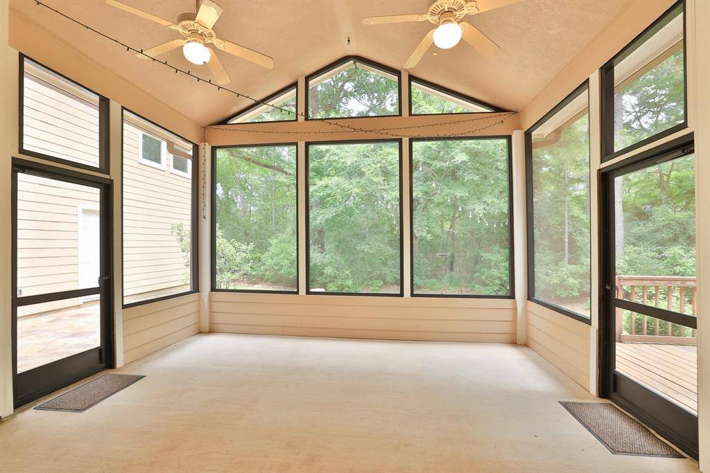 The outdoor living space offers the perfect spot to hang a hammock, create a cozy seating area, or set up an al fresco dining space, all overlooking your private backyard with no back neighbors. Horses are welcome here, and the property backs directly to the horse riding trails of Indigo Lake Estates, making it a dream setting for equestrian and nature lovers alike!