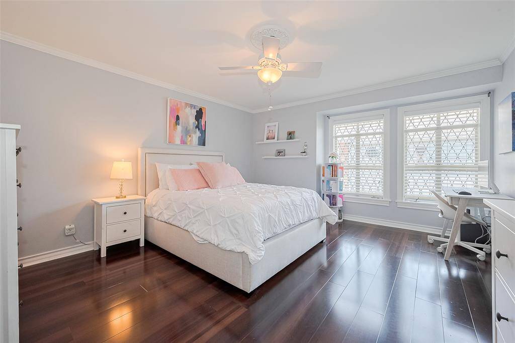 Brand new laminate flooring all throughout the upstairs!  3 bedrooms and this is the lovely primary! This light-filled primary bedroom offers a peaceful retreat.  New flooring and crown molding make this space both stylish and functional. A large window nook with dual windows allows for abundant natural light while offering the perfect space for a reading area or home office.