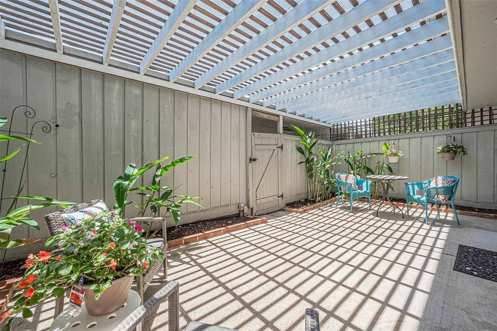 Covered spacious back patio. Perfect for relaxing during the summer
