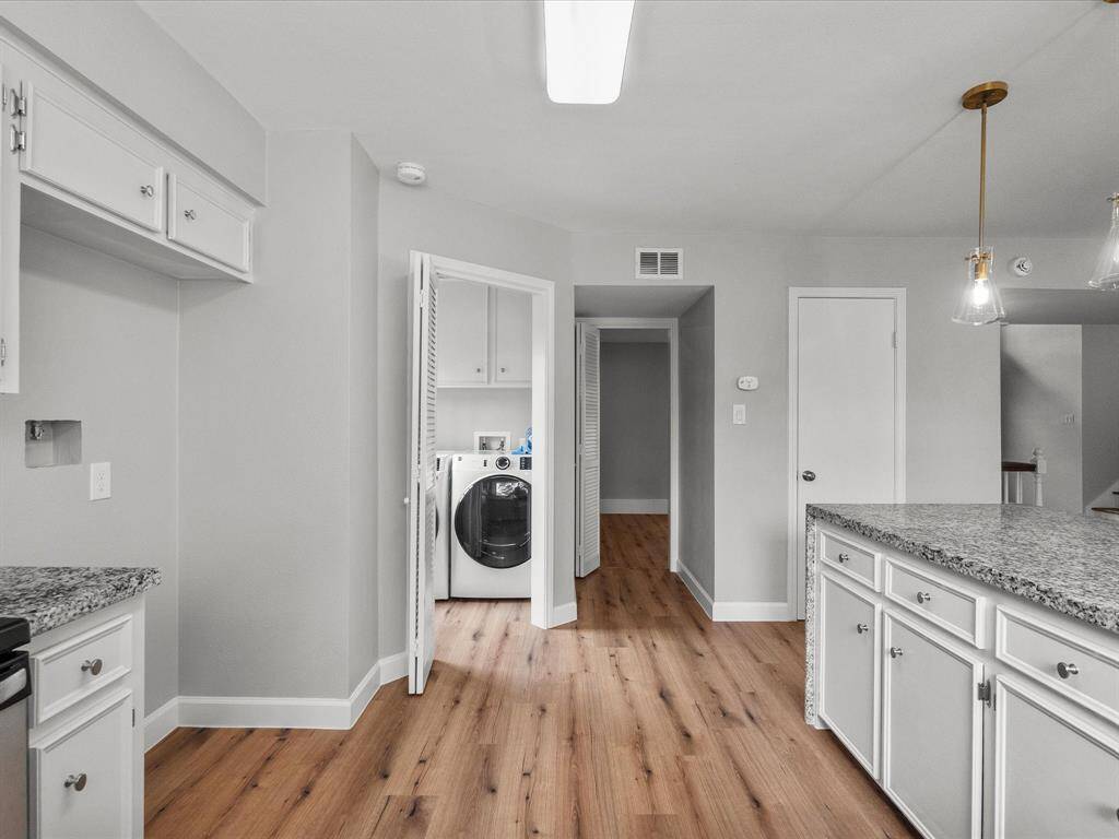 Bright and inviting kitchen with ample natural light.