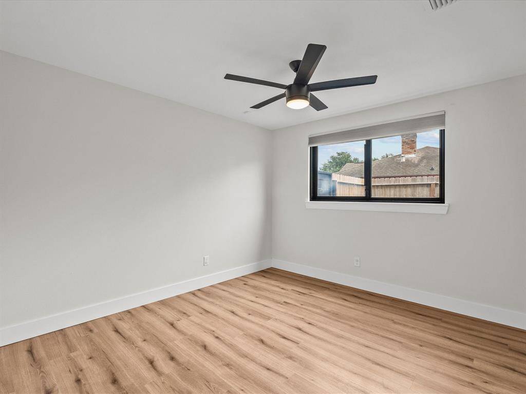 Laundry convenience with included washer and dryer, plus easy courtyard access through a side door.