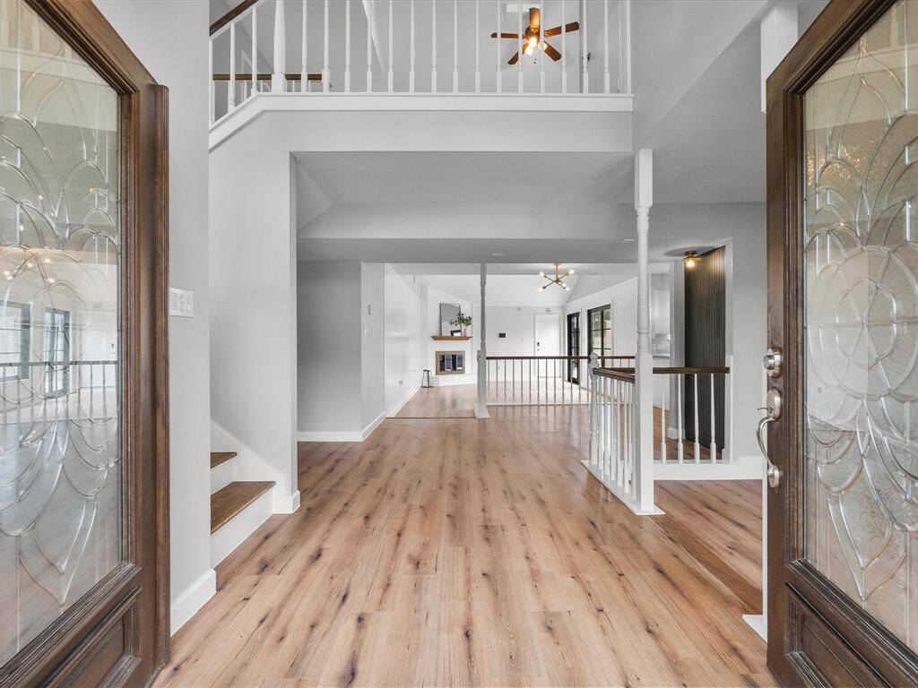 Step through elegant double mahogany doors into your dream home.