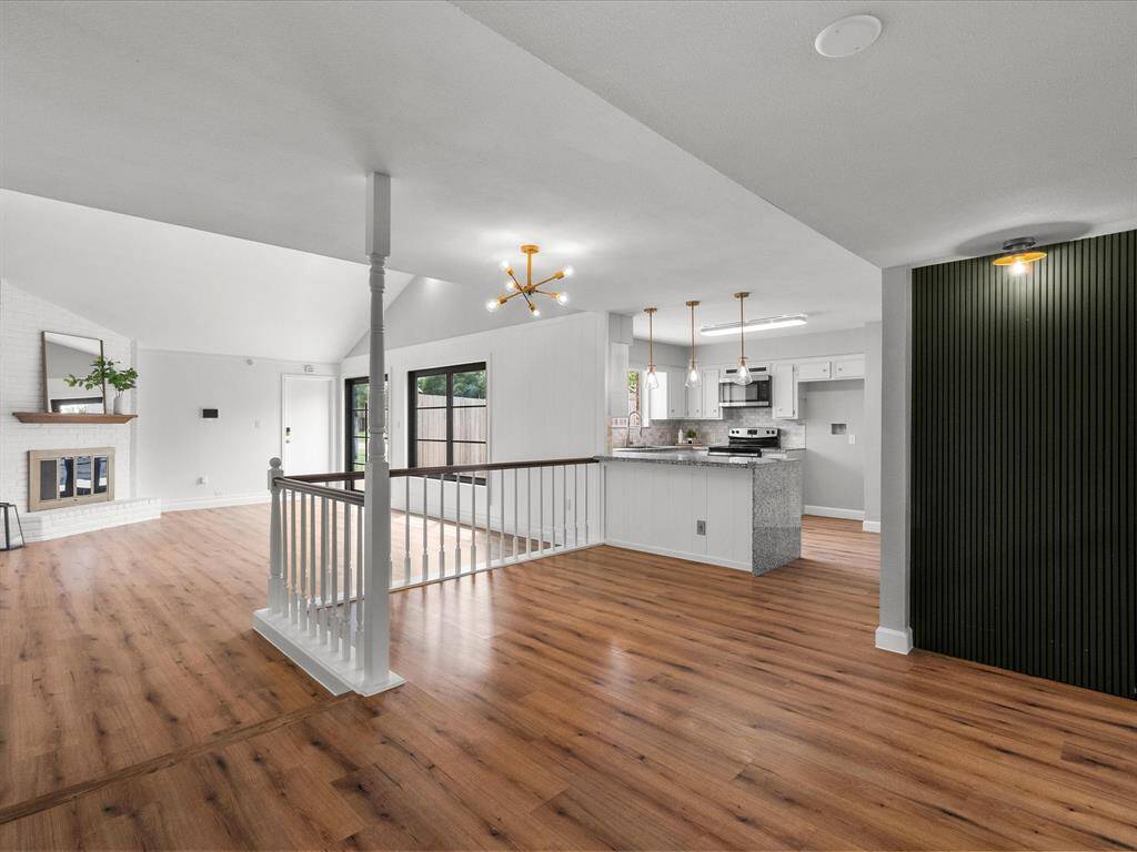 Spacious open-concept kitchen and breakfast area.