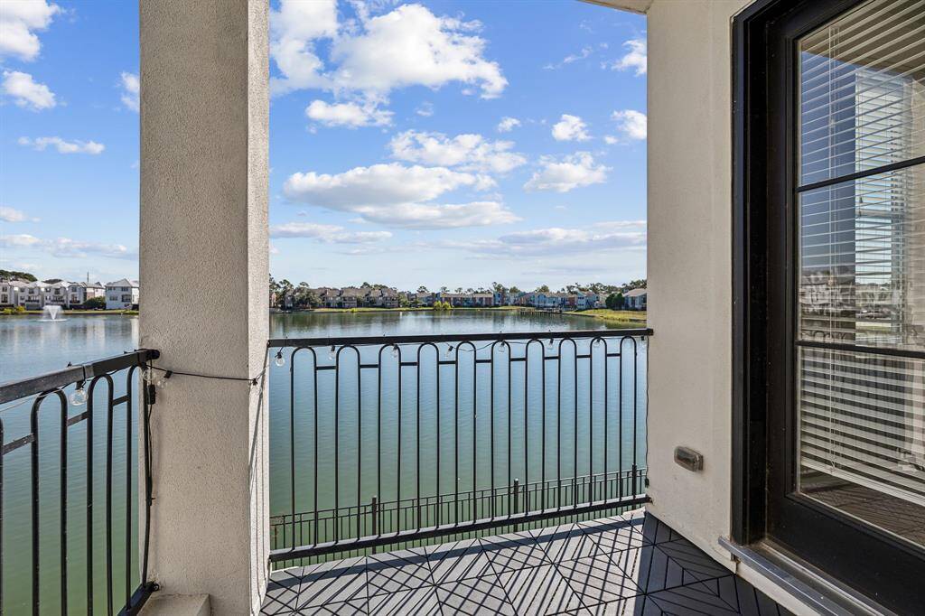 Balcony off the family room with the views of the lake