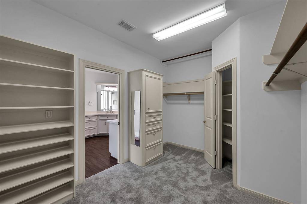 Lots of built ins in this large closet!