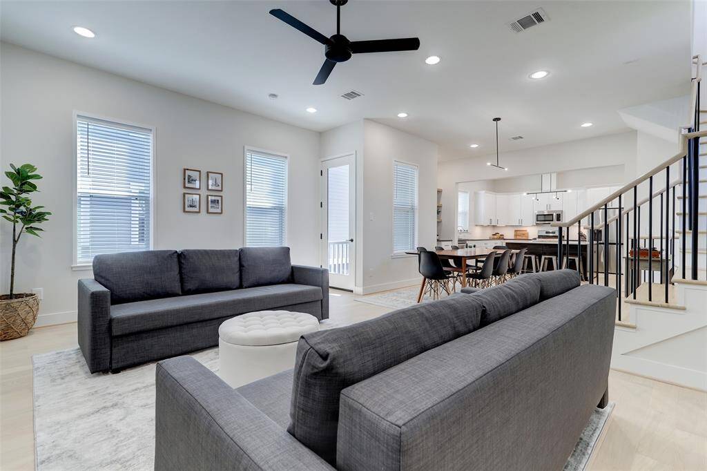 Living room opens up directly to the dining and kitchen.