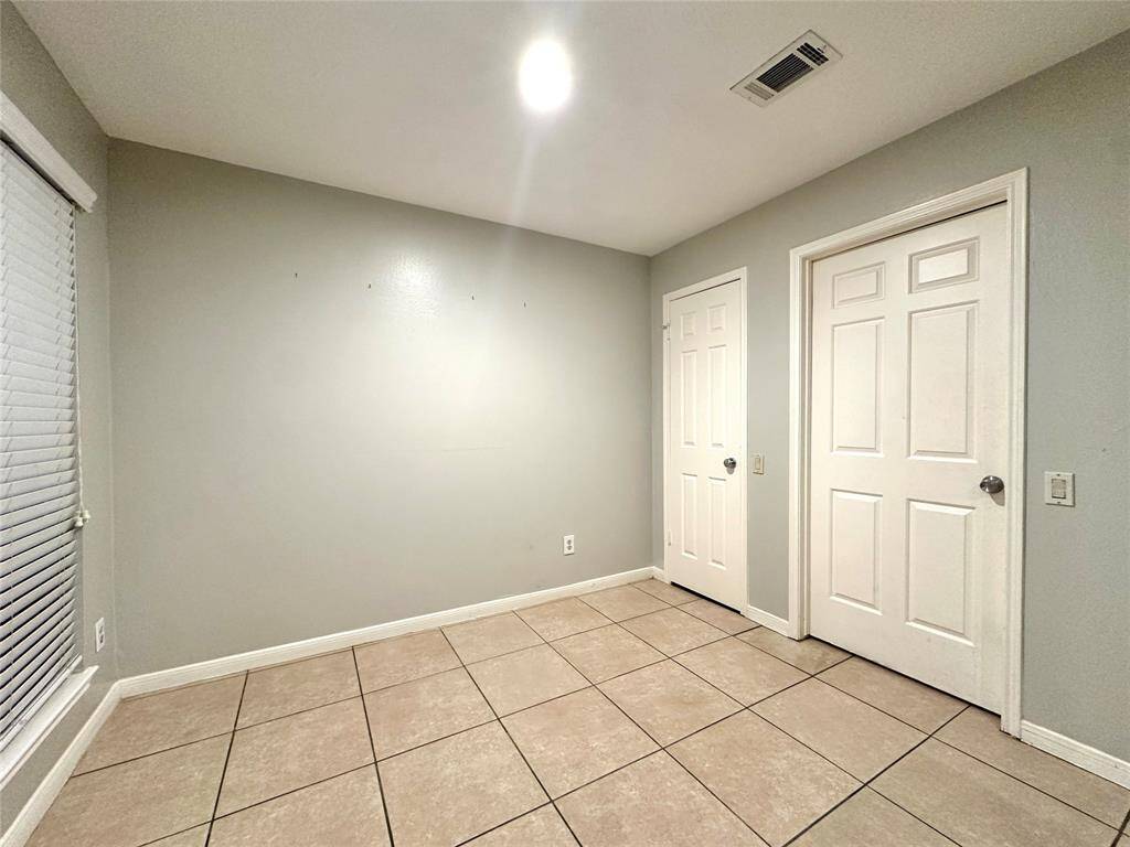Access to the utility room and garage, and large pantry.