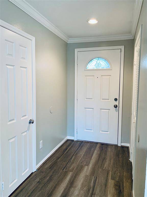 Entry into home - all hard floors. Wood laminate flooring and recently painted front door and all interior!