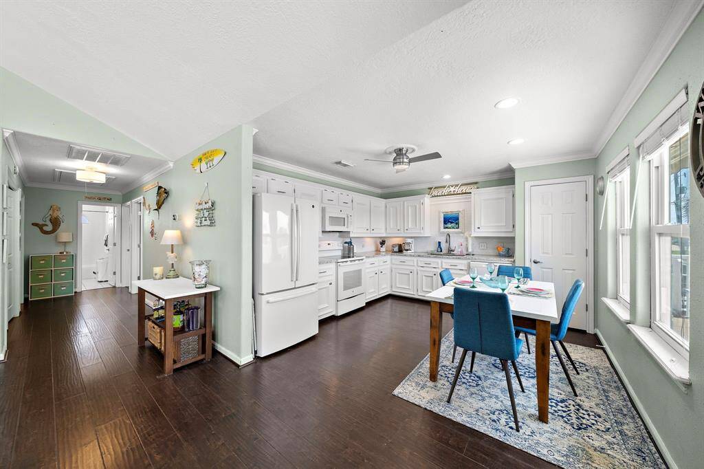 Beautiful new energy-star white appliance package, new granite countertops & gleaming white glass backsplash. A plethora of storage with a BONUS separate pantry!