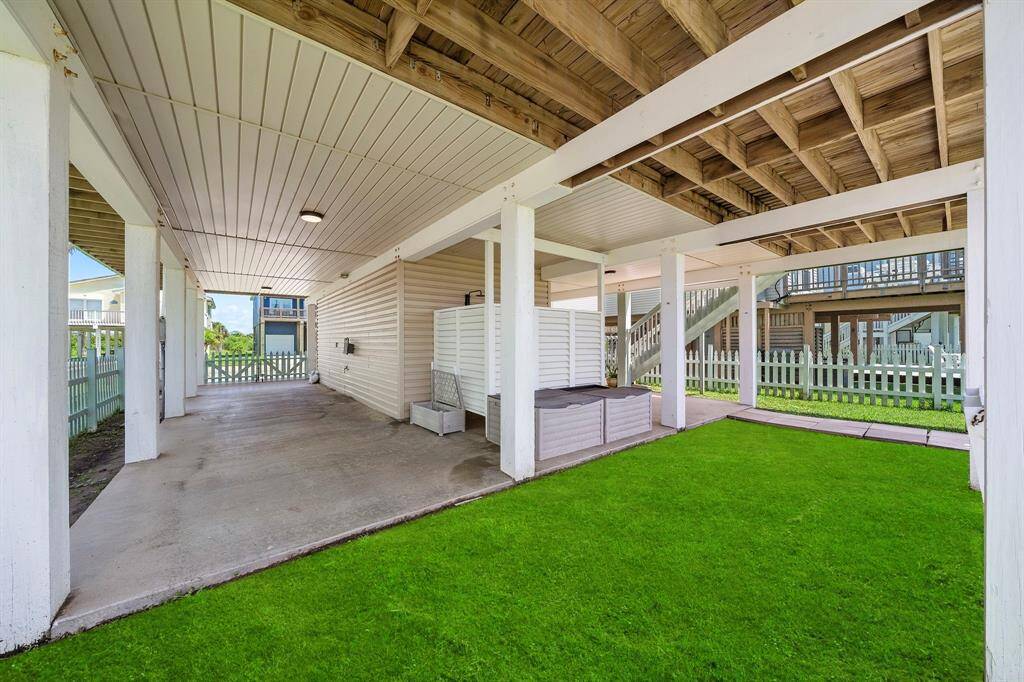 Awesome covered patio area & storage solutions for all your beach toys and outdoor games.