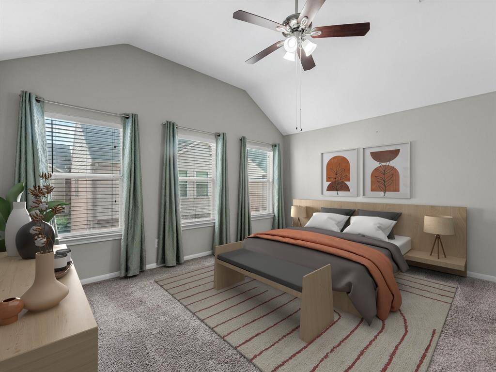 The primary bedroom is sizable and filled with light, but blackout curtains make this space super dark and comfortable for daytime naps.(Photo has been virtually staged.)