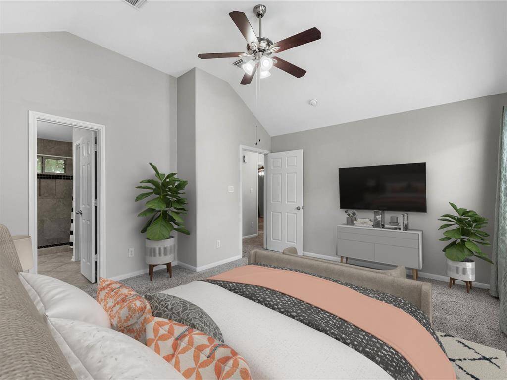 An alternate view of the primary bedroom.(Photo has been virtually staged.)